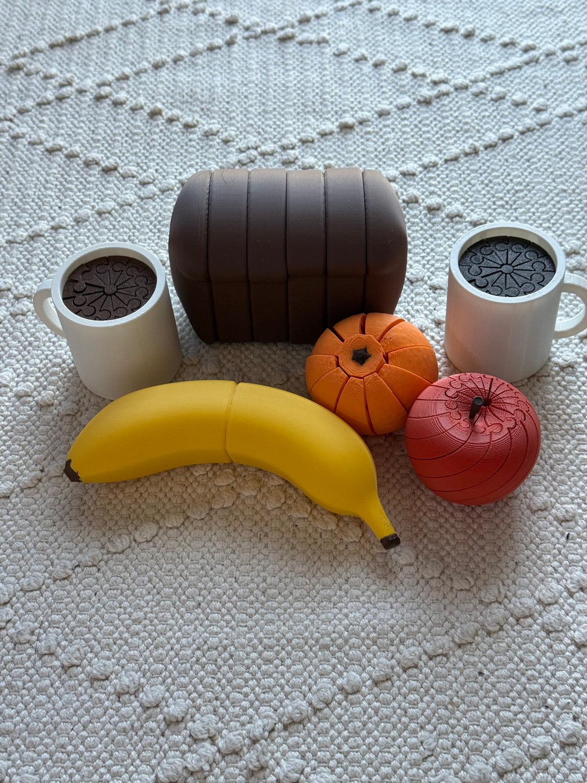 Pretend-play banana in a breakfast-themed arrangement with other play food, sold separately