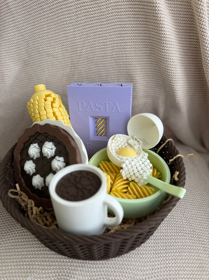 Coffee cup styled in a basket with other pretend-play food, sold separately